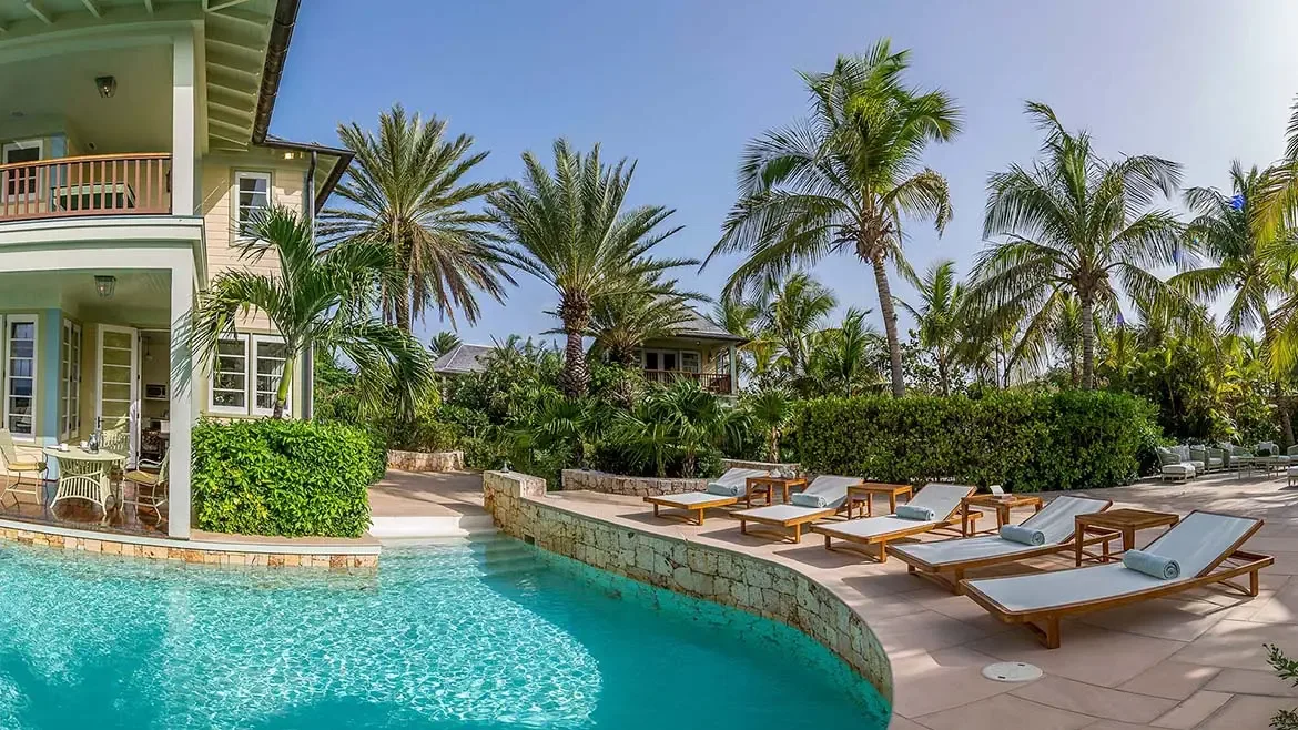 Immerse yourself in the serene beauty of Anguilla from the expansive private balcony at Villa Santosha. Enjoy breathtaking views of the Caribbean Sea and the swaying palms of Long Bay, creating a perfect sanctuary for relaxation.