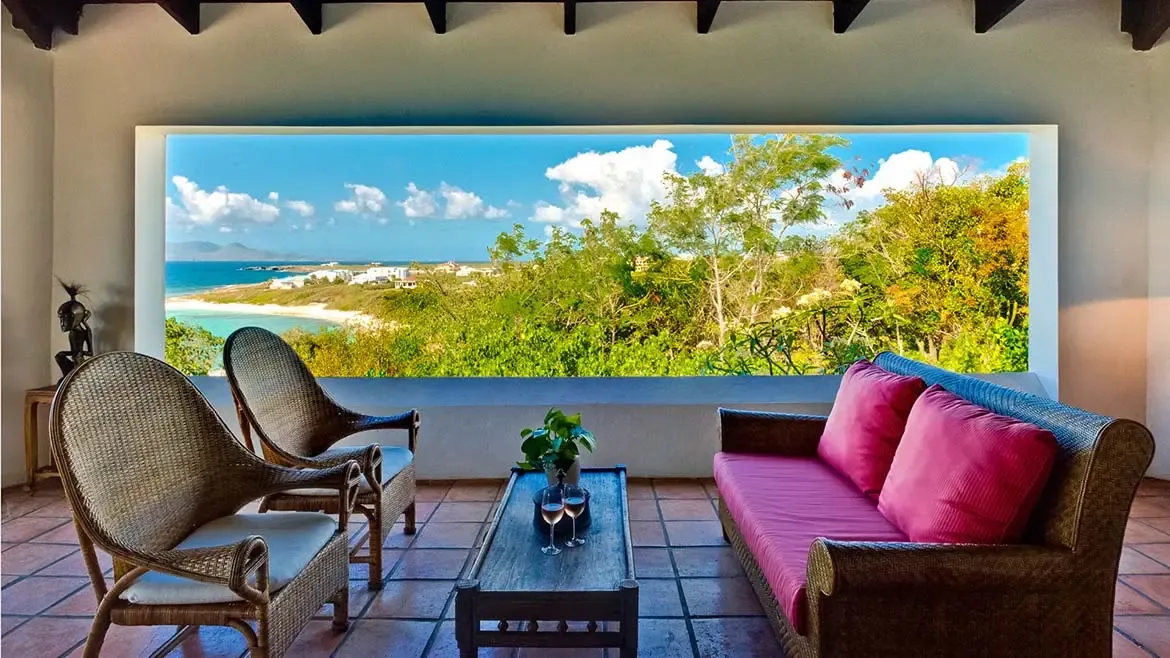 Zenaida Estate stands gracefully at Anguilla's highest point, surrounded by three acres of manicured tropical gardens with breathtaking 360-degree views of the Caribbean.