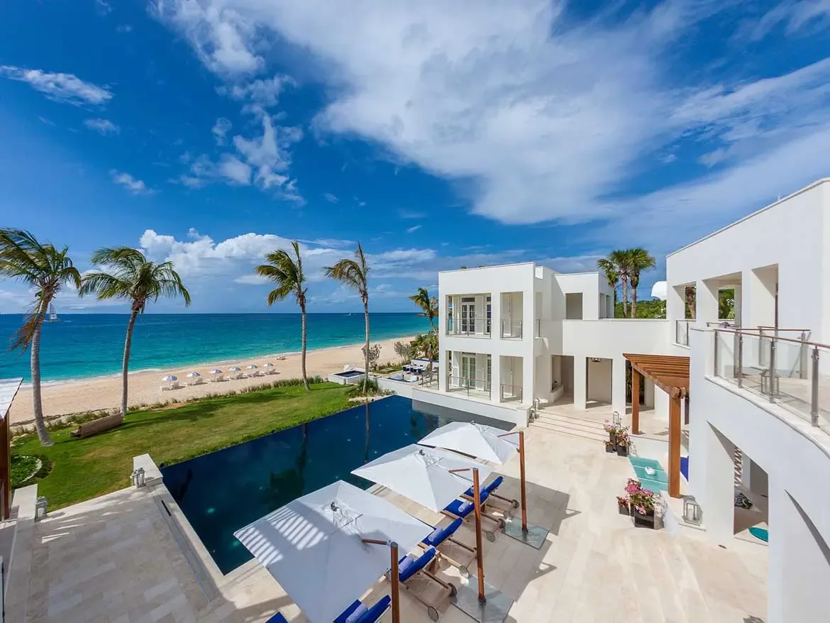 Experience the ultimate Caribbean escape at Cerulean Villa, a premier luxury beachfront estate in Anguilla featuring a spectacular infinity pool and direct access to pristine white sands. This modern architectural masterpiece offers breathtaking ocean views and expansive outdoor living spaces, perfect for an exclusive tropical getaway.