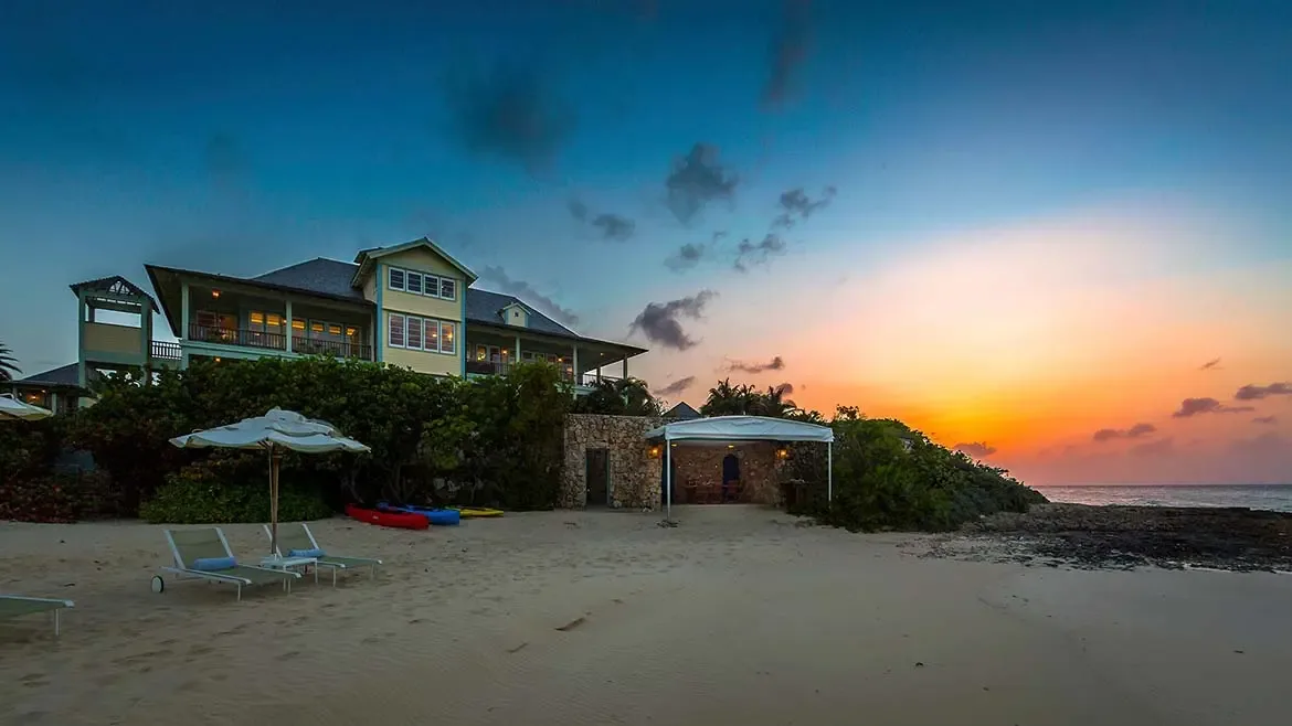 Perched elegantly on the powdery white sands of Long Bay, the expansive Villa Santosha estate offers breathtaking Caribbean views and secluded luxury in the heart of Anguilla.