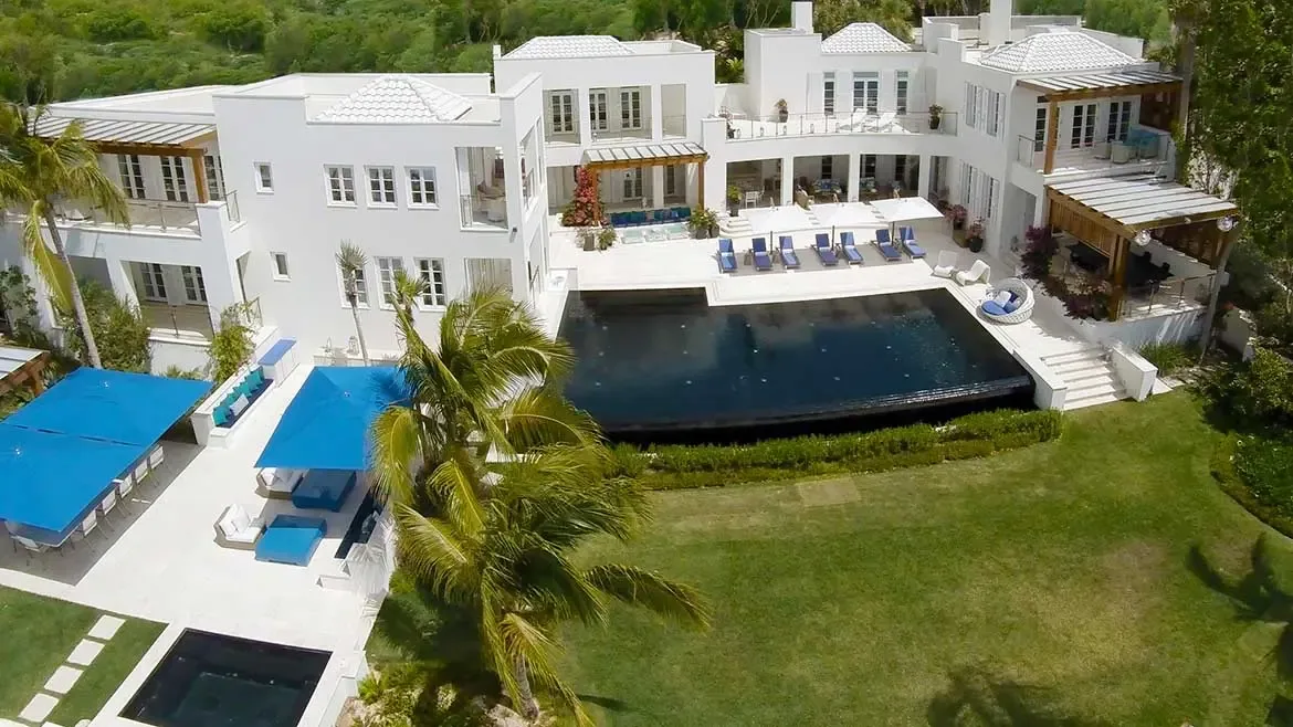 Experience the pinnacle of Caribbean elegance at Cerulean Villa in Anguilla, featuring a spectacular infinity-edge pool and expansive outdoor entertaining spaces. This sprawling white-stone estate offers a private oasis of luxury, perfect for high-end travelers seeking an unforgettable island escape.