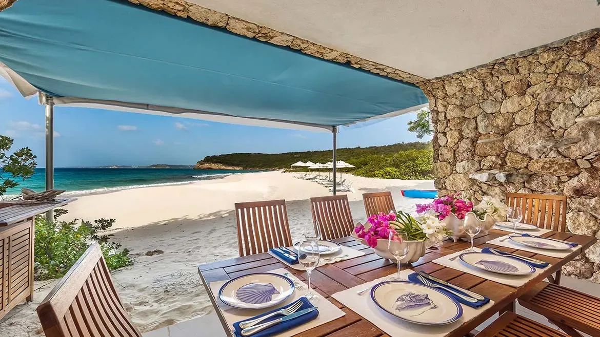 Perfect your swing on the private tennis court at Villa Santosha, an exceptional amenity that pairs active living with the breathtaking Caribbean ambiance of Long Bay.