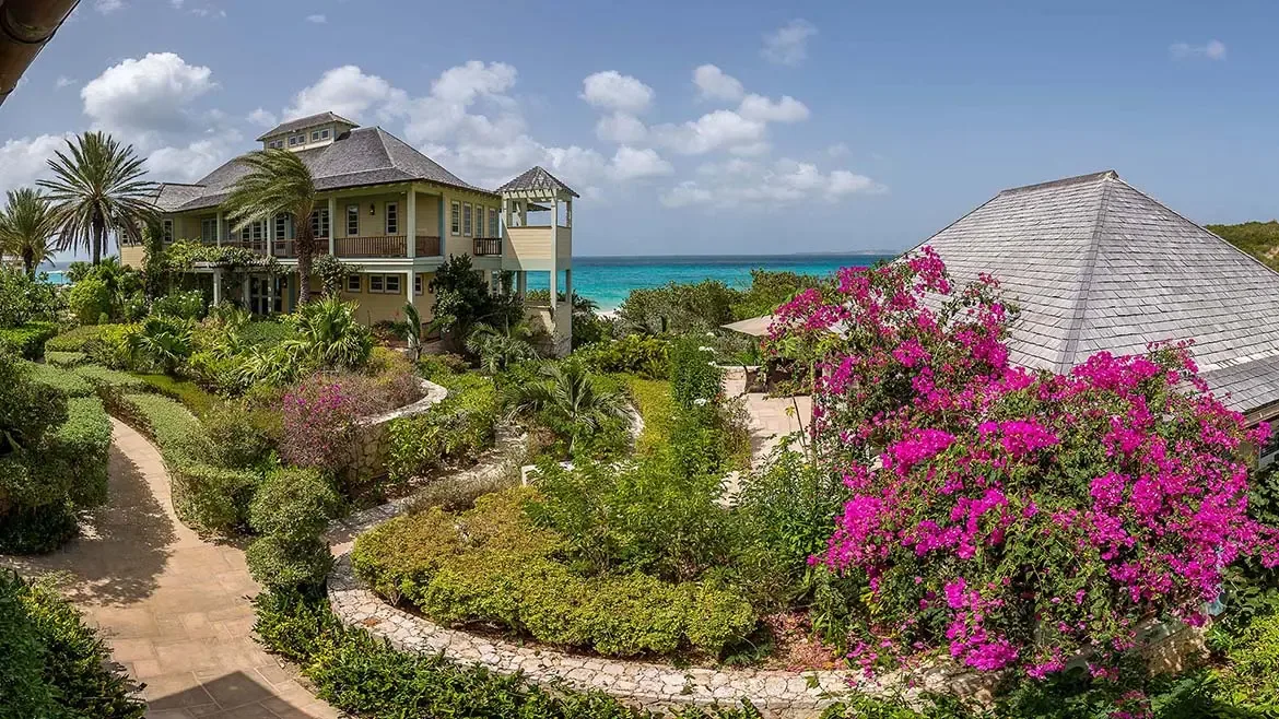 Relax in style on the expansive pool deck of Villa Santosha, overlooking the shimmering turquoise waters of Long Bay. With comfortable loungers and breathtaking Caribbean views, this is the perfect spot to unwind as the sun sets over Anguilla.