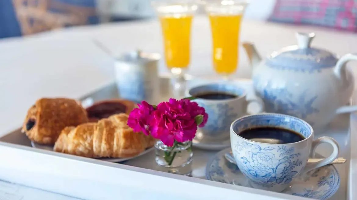 Experience the ultimate in personalized luxury with a private breakfast service delivered to your suite at Cerulean Villa. This elegant morning spread features freshly baked pastries, gourmet coffee, and chilled juices served in fine china for a sophisticated start to your Anguilla vacation.