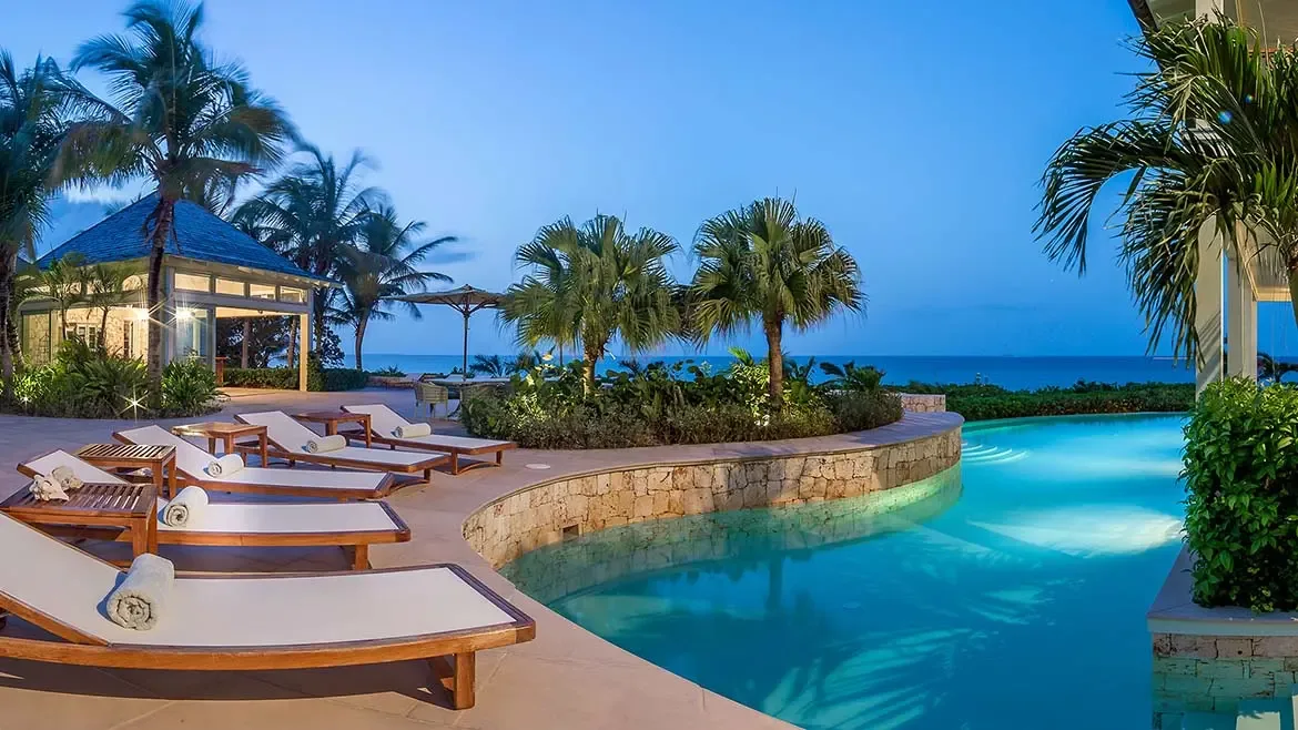 Experience Villa Santosha's magnificent beachfront setting from above, where the powdery white sands of Long Bay stretch along the crystal-clear turquoise waters of Anguilla's Caribbean coastline.