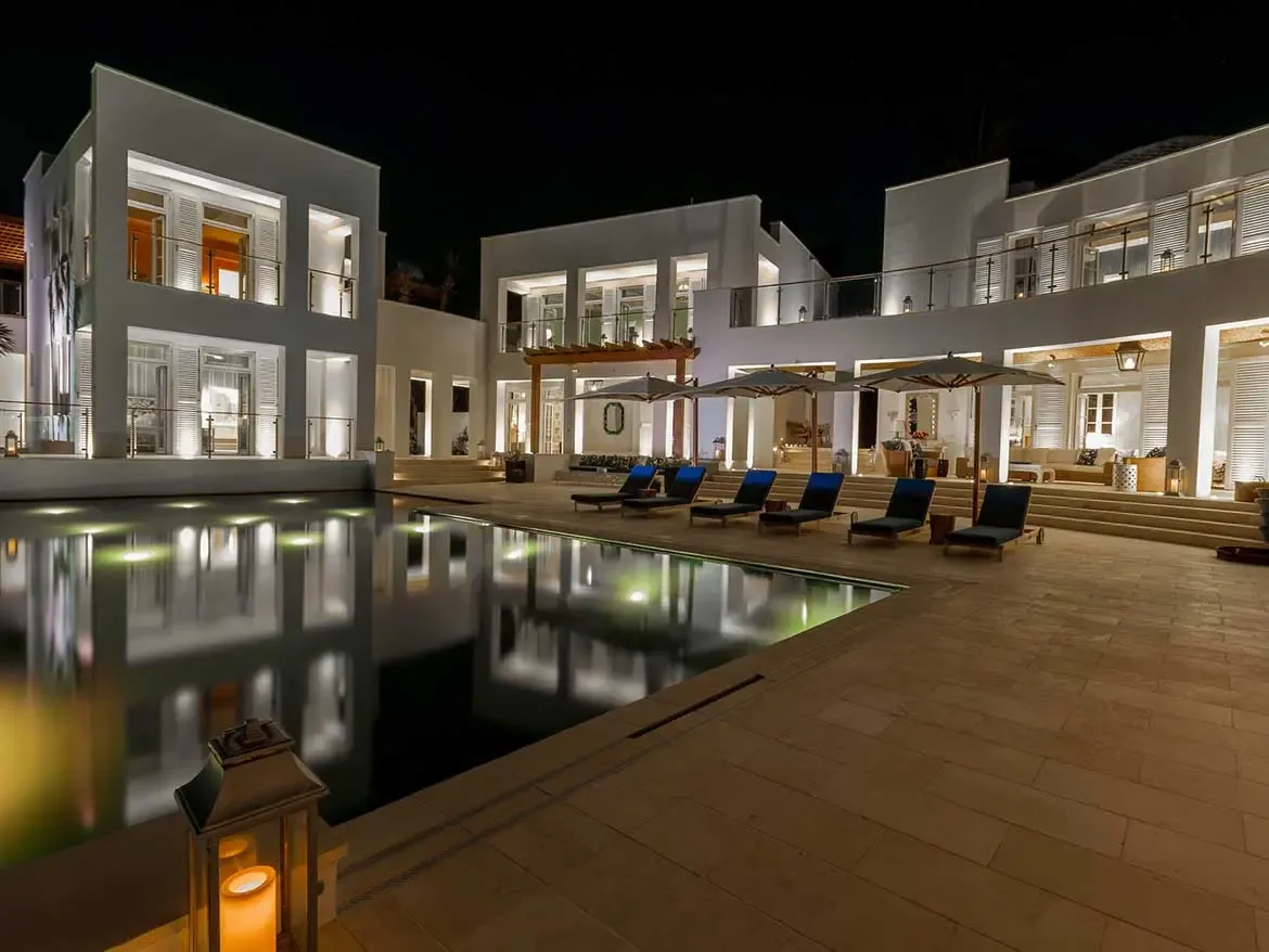 Experience the ultimate Caribbean escape at Cerulean, a breathtaking luxury villa in Anguilla featuring sleek modern architecture and a stunning infinity pool that glows at twilight. This sprawling estate offers unparalleled privacy and world-class amenities, making it the premier choice for an unforgettable upscale beachfront getaway.