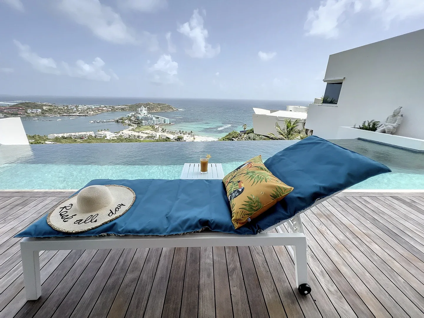 Outdoor daybed with pool view