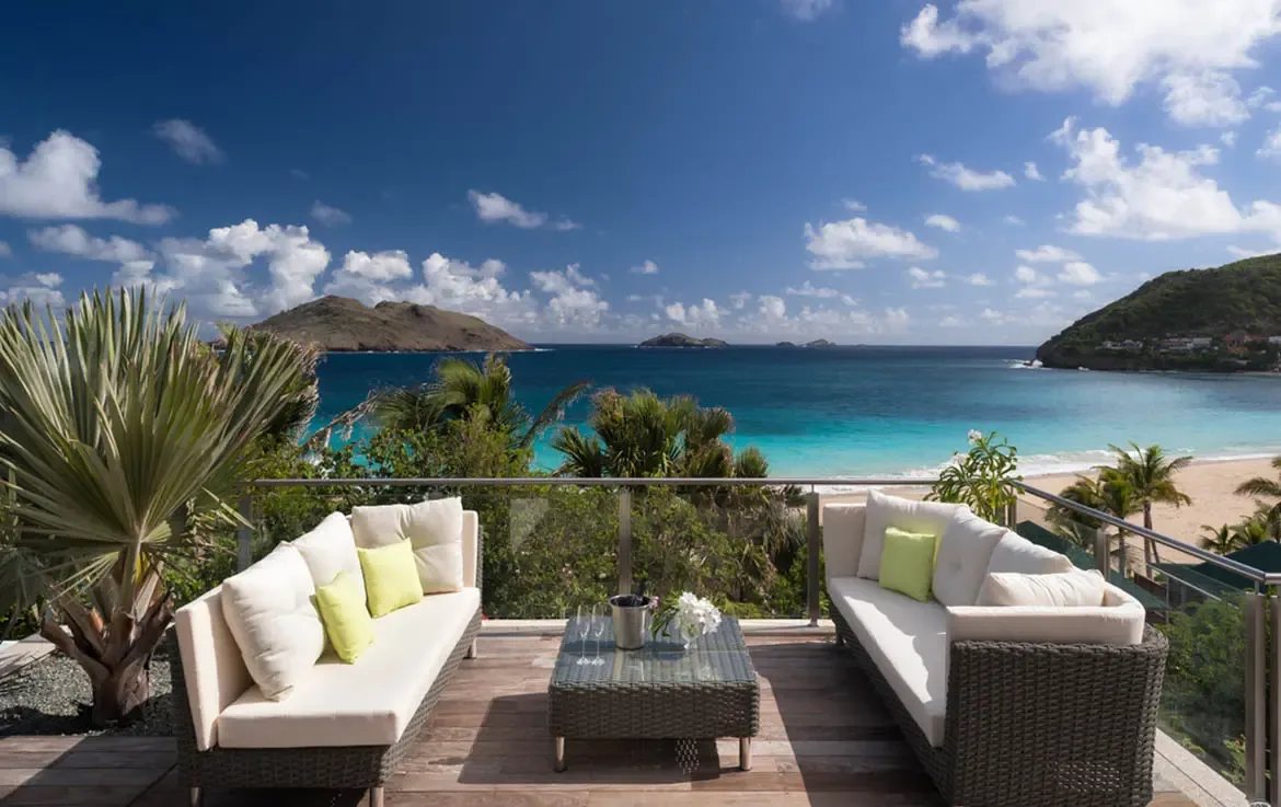 The ultimate viewpoint: relax on the outdoor lounge deck overlooking the pristine sands of Gouverneur Beach.