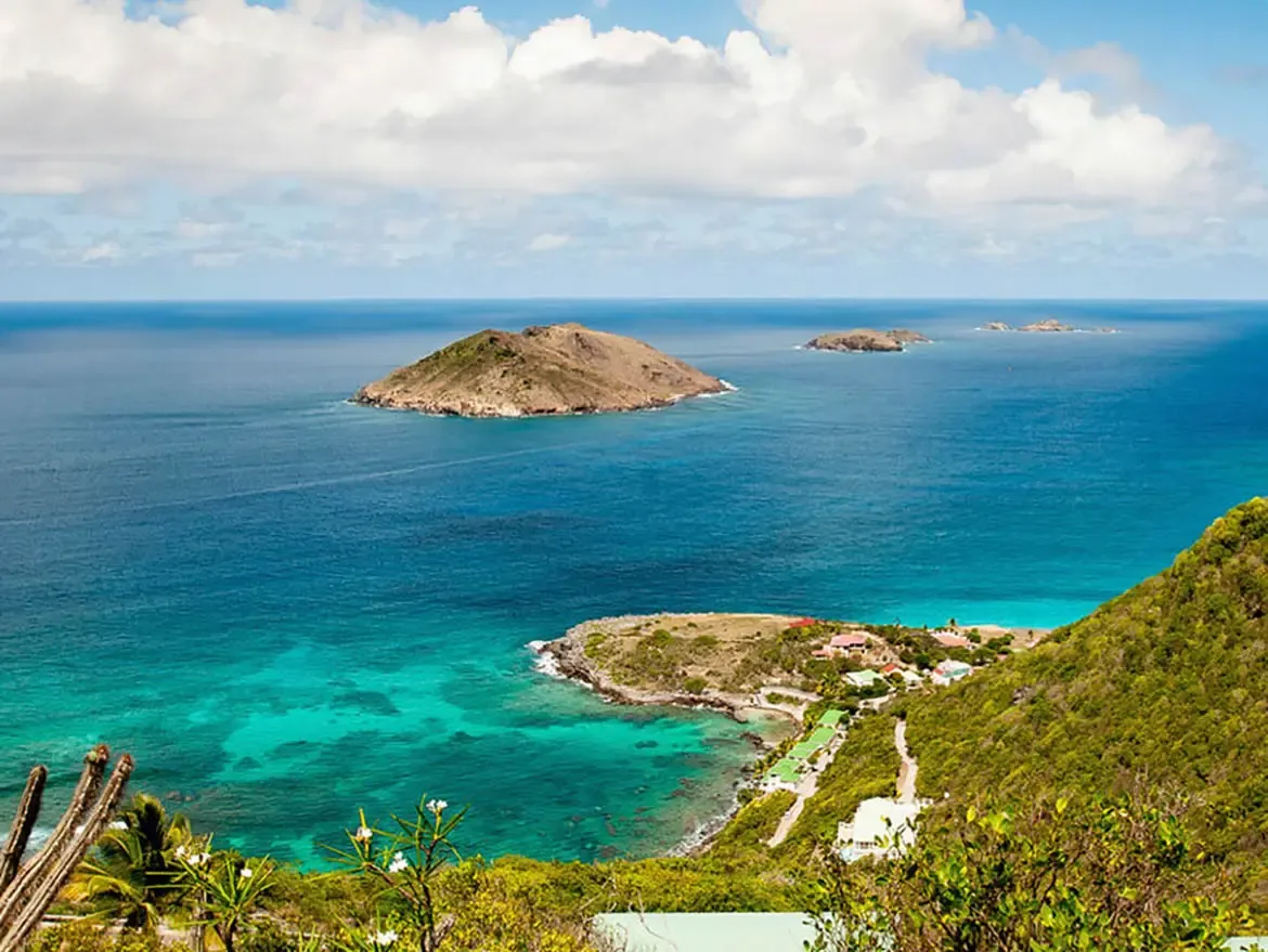 Unveil the breathtaking panorama of St. Barths from Villa Byzance, where turquoise waters meet distant islands under a bright sky. This secluded retreat offers unparalleled views and a serene escape into Caribbean paradise.                                                                                                                                                                                                                                                                                            +
 