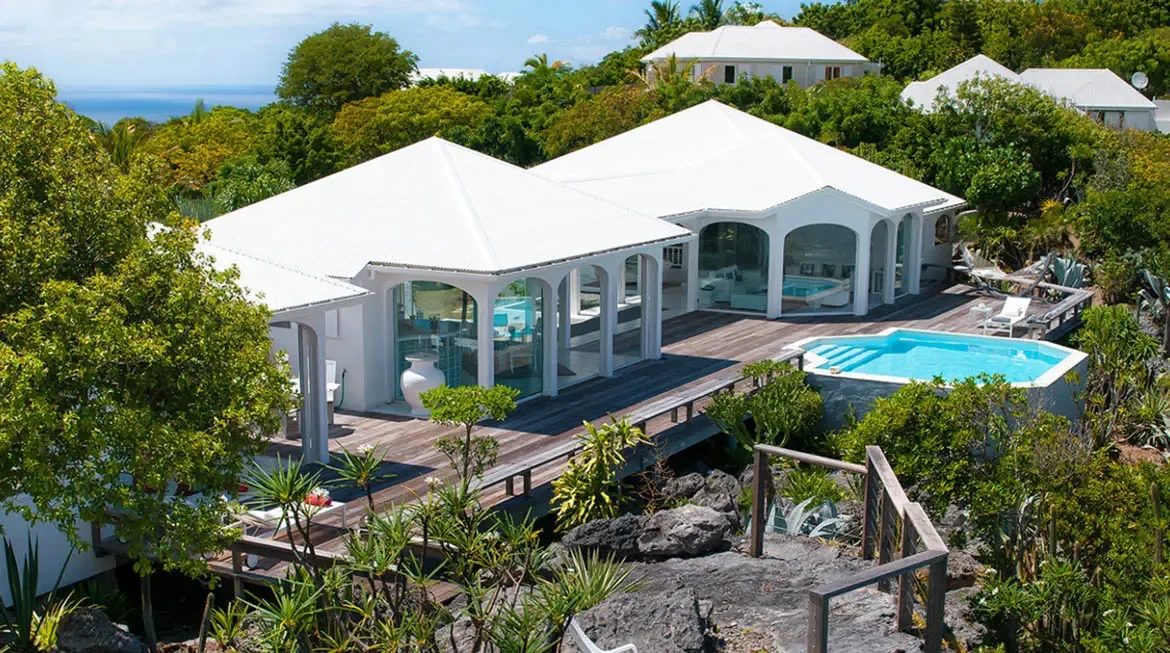 Indulge in the serene luxury of Villa Byzance, where a shimmering pool blends with lush tropical gardens and sweeping ocean vistas. This exclusive St. Barths retreat offers effortless elegance and privacy amid Caribbean beauty.                                                                                                                                                                                                                                                                                           +
 