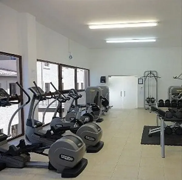 State-of-the-art fitness center with premium equipment — stay active during your Caribbean getaway.