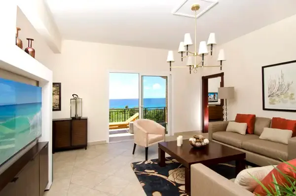 Open-concept living flows seamlessly to a private patio with stunning ocean views — indoor-outdoor living at its finest.