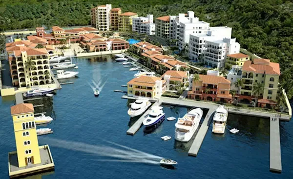 Stunning aerial view of the marina with luxury yachts and Mediterranean architecture — the best of Porto Cupecoy.