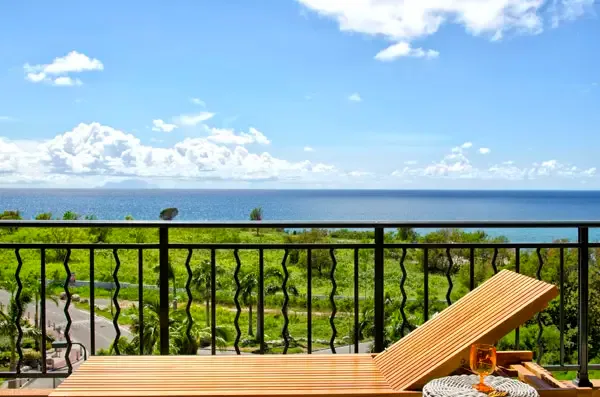Unwind on the sun-drenched terrace with sweeping panoramic views of the Caribbean — ideal for sunset cocktails.