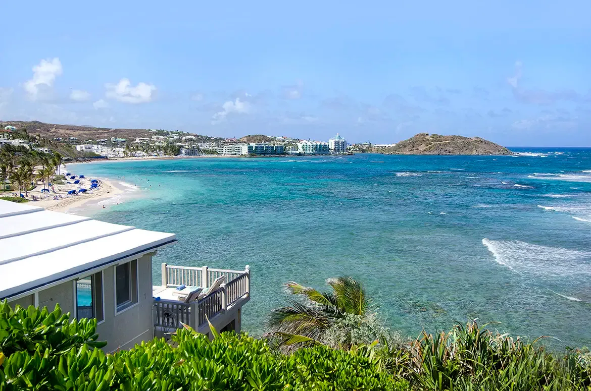 Wake up to panoramic beachfront views with direct access to Dawn