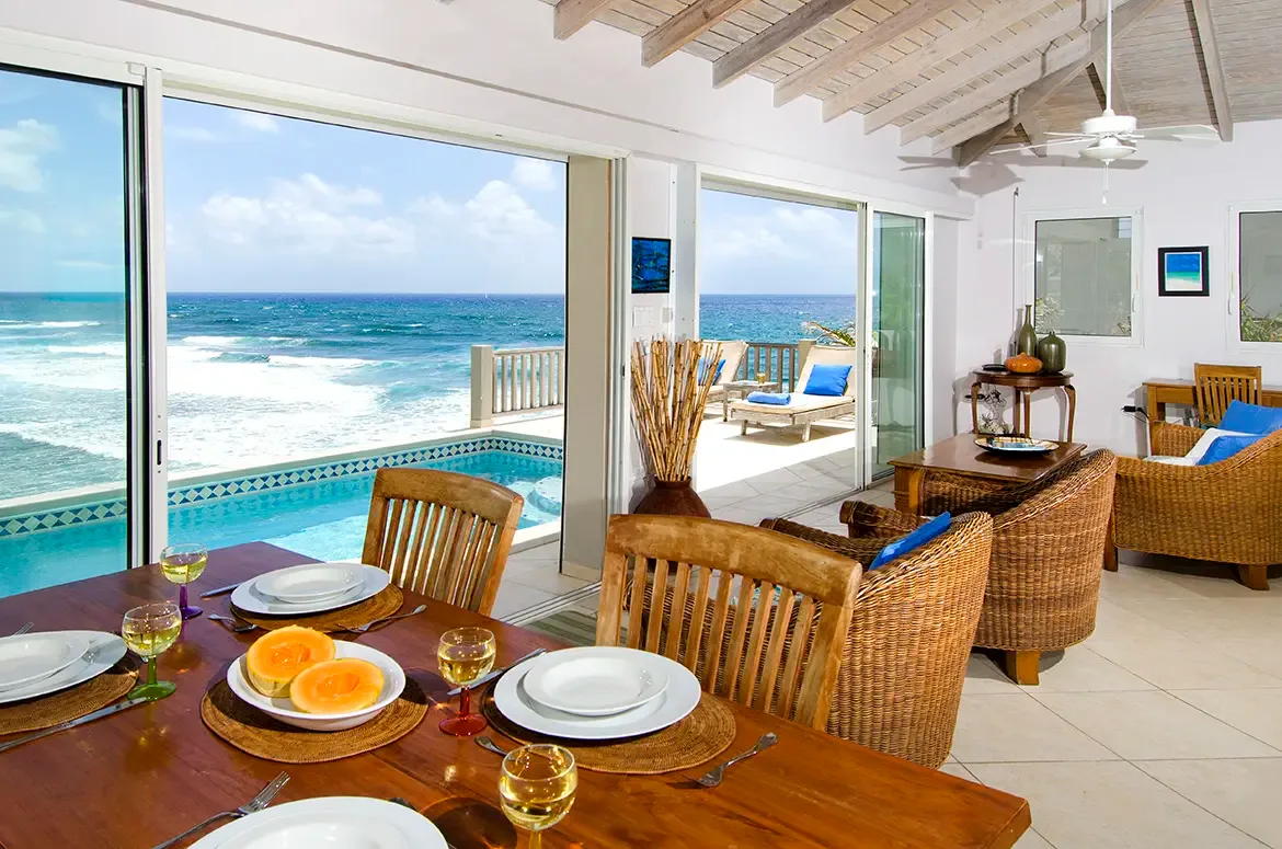 Dine alfresco-style indoors with the Caribbean Sea as your ever-changing backdrop.