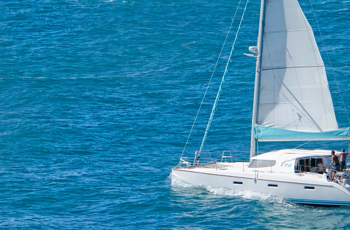 Adventure awaits — sail the Caribbean waters on a catamaran and explore hidden coves.