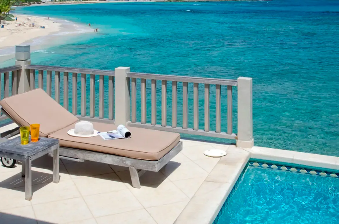 Your private terrace awaits — complete with pool, lounge chair, and the perfect spot for sunset cocktails.