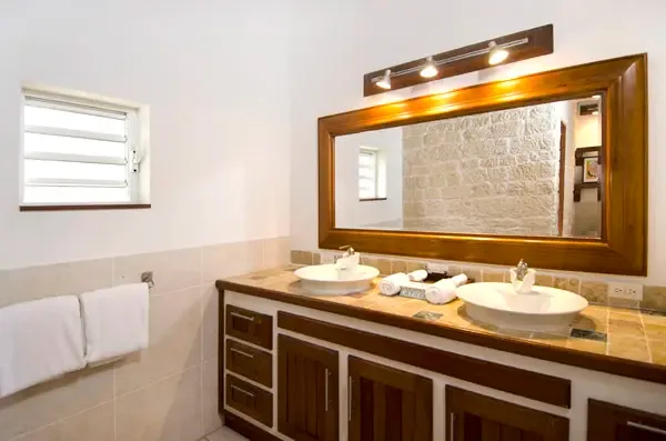 Thoughtful details matter — a bathroom designed with Caribbean elegance and functionality.