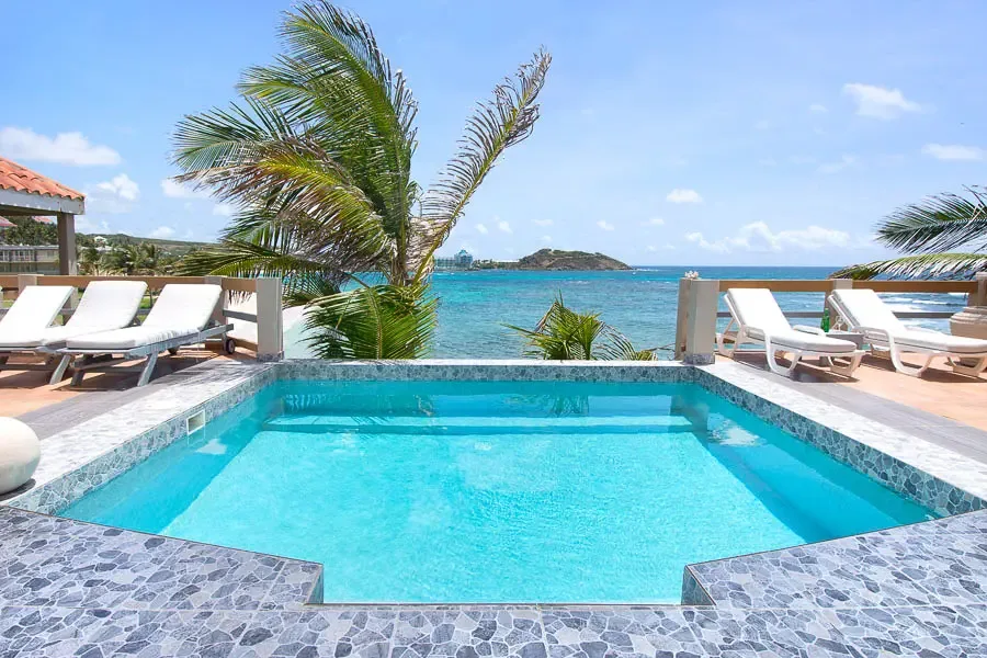 Soak up the Caribbean sun by your private infinity pool — where turquoise waters meet endless ocean views.