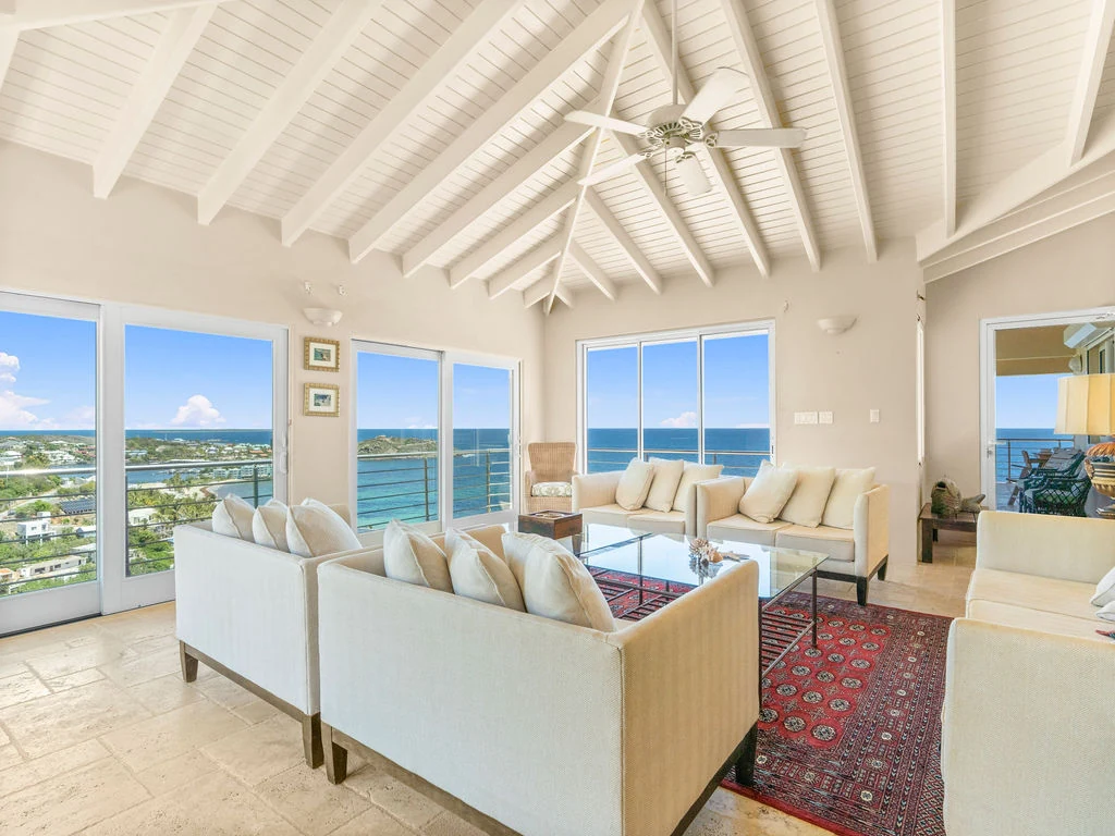 Open living and dining room with ocean views