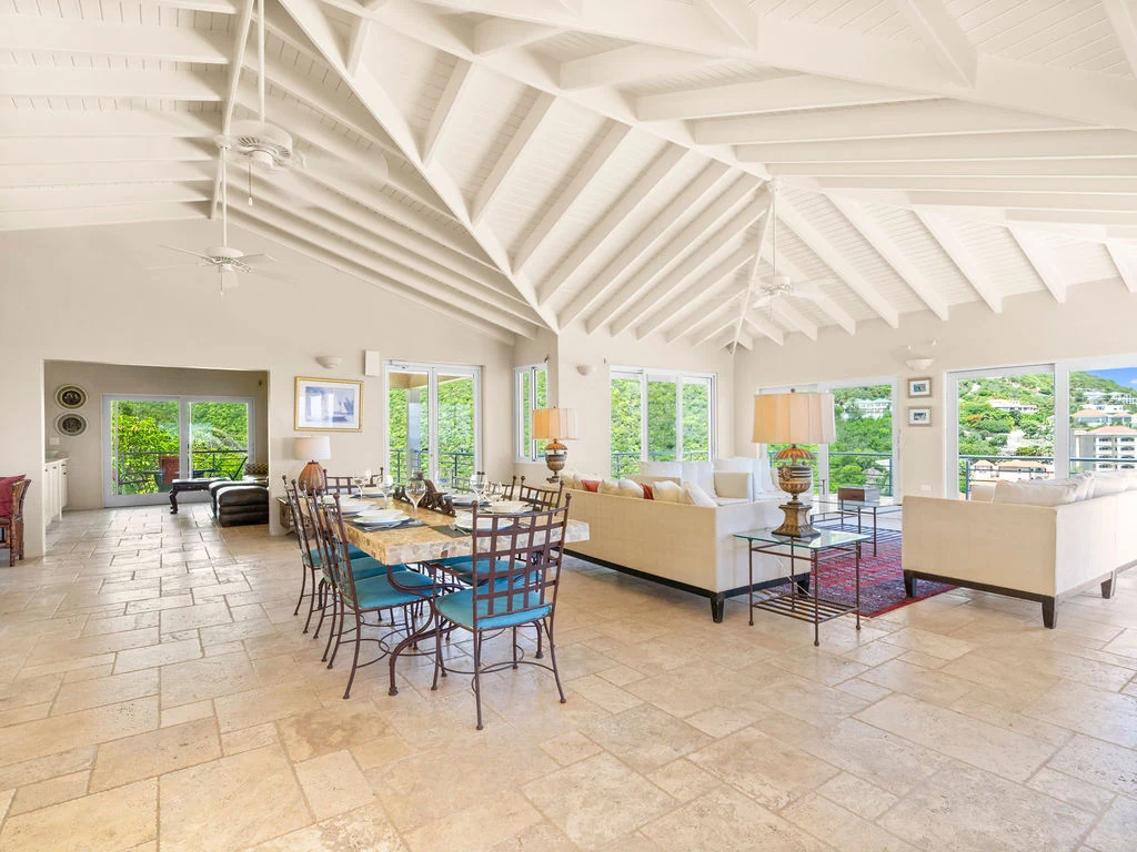 Open living and dining room with ocean views