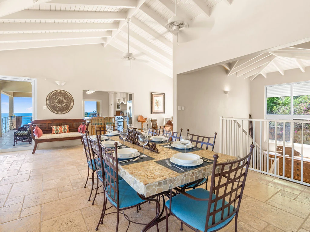 Open living and dining room with ocean views