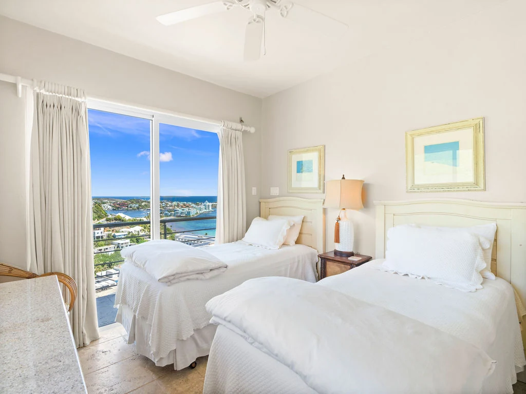 Twin bedroom with ocean views