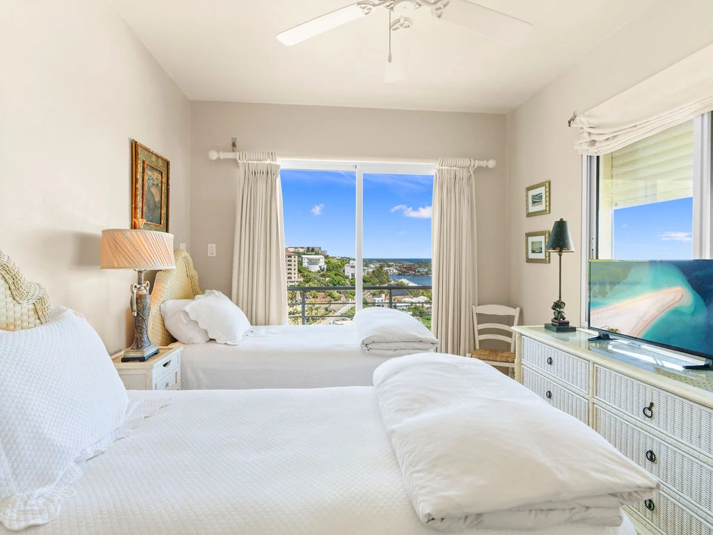 Twin bedroom with ocean views