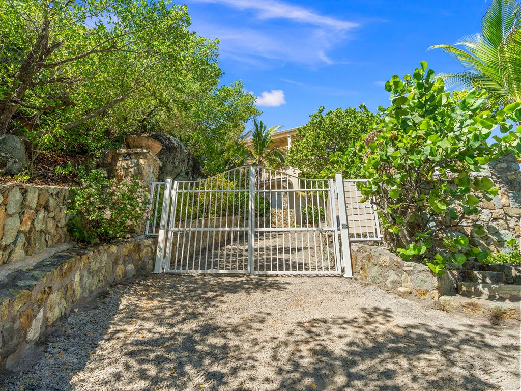Gardens, pathways, and entrance gate