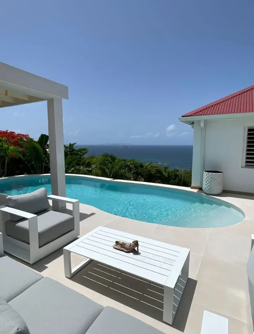 Your infinity pool melts into the Caribbean horizon — sunset swims never felt this magical.                                                                                                                                                                                                                                                                                                                                                                                                                  +
 