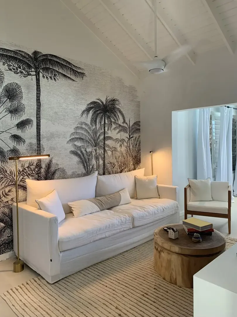 A striking tropical mural and natural wood accents create an inviting retreat.                                                                                                                                                                                                                                                                                                                                                                                                                                               +
 