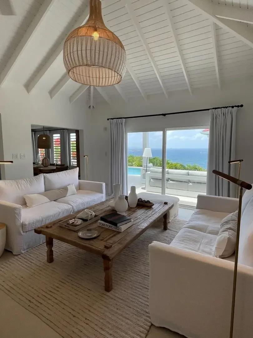 Sink into plush sofas while gazing through sliding doors at your private pool and the ocean beyond.                                                                                                                                                                                                                                                                                                                                                                                                                         +
 