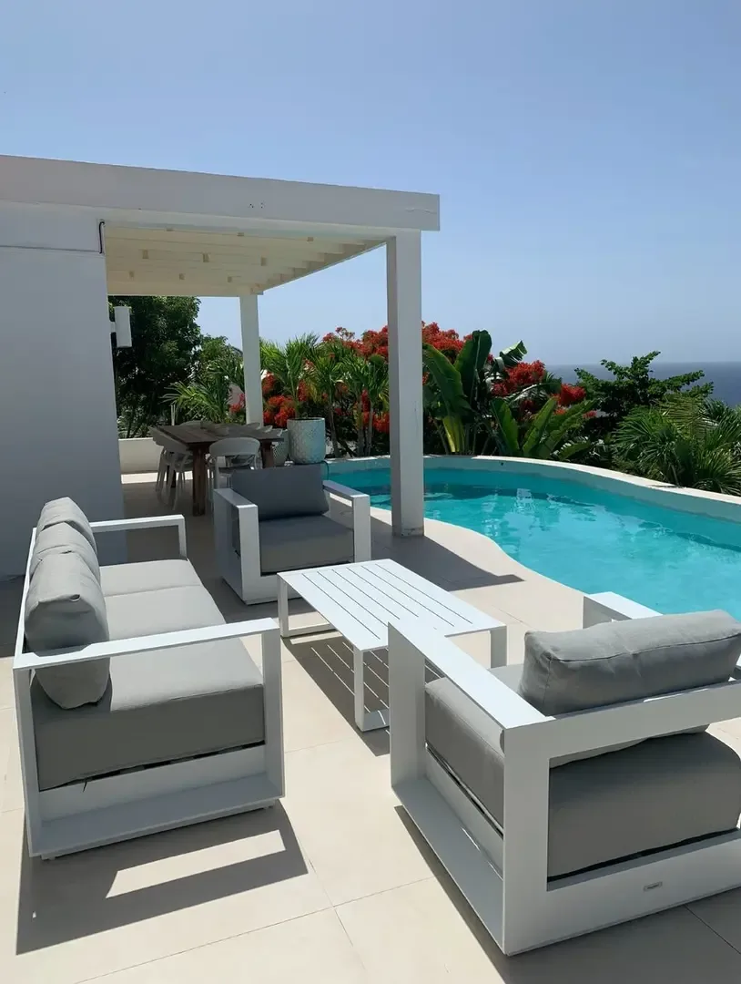 Lounge in your private terrace, where turquoise waters and tropical blooms frame every moment.                                                                                                                                                                                                                                                                                                                                                                                                                             +
 