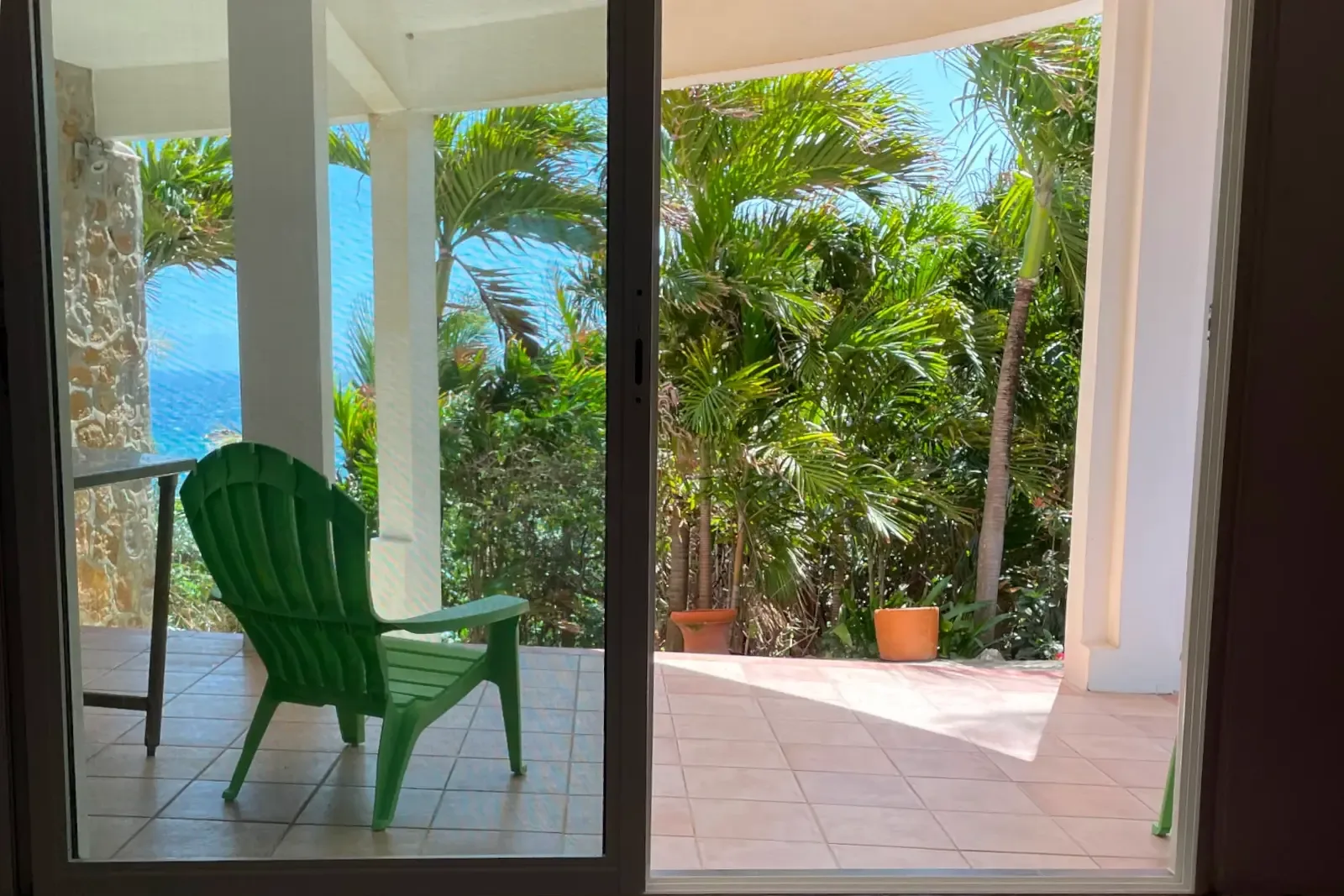 A bright living area opens to the patio — indoor-outdoor living at its best.