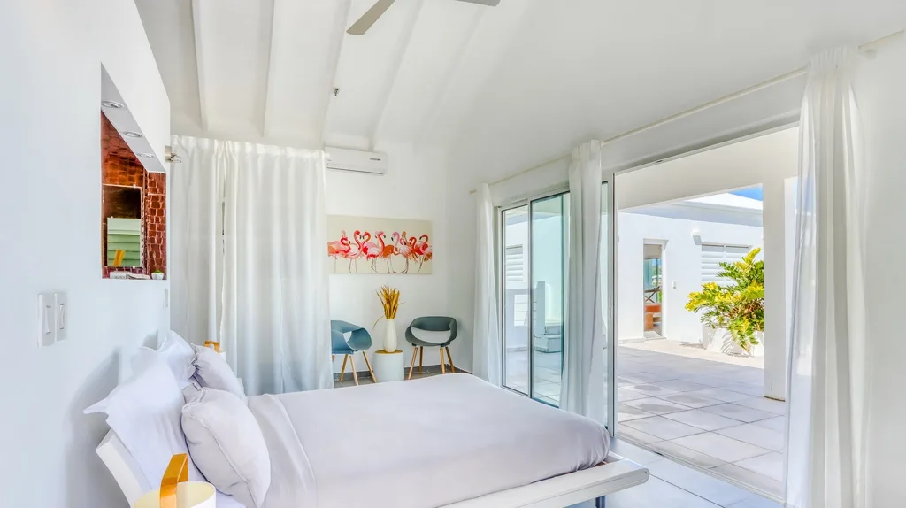 Bedroom with terrace access and partial sea view