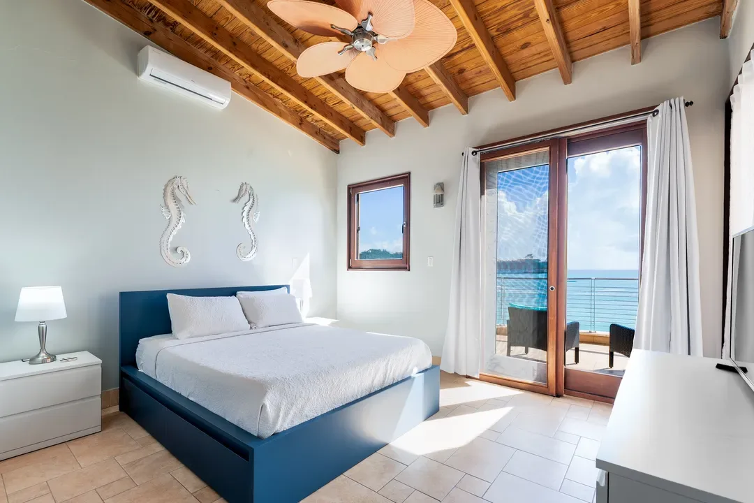Wake up to ocean views and step directly onto your private balcony — the perfect Caribbean retreat.