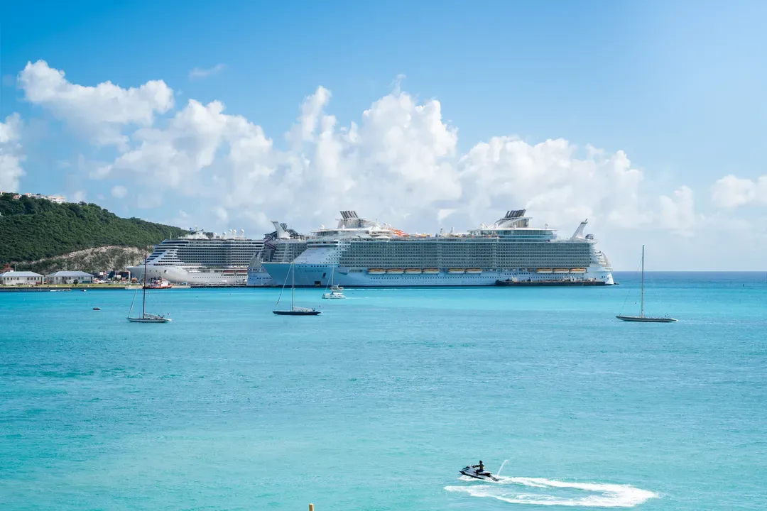 Adventure awaits in the harbor — jet skis, sailboats, and a cruise ship painting the perfect Caribbean scene.