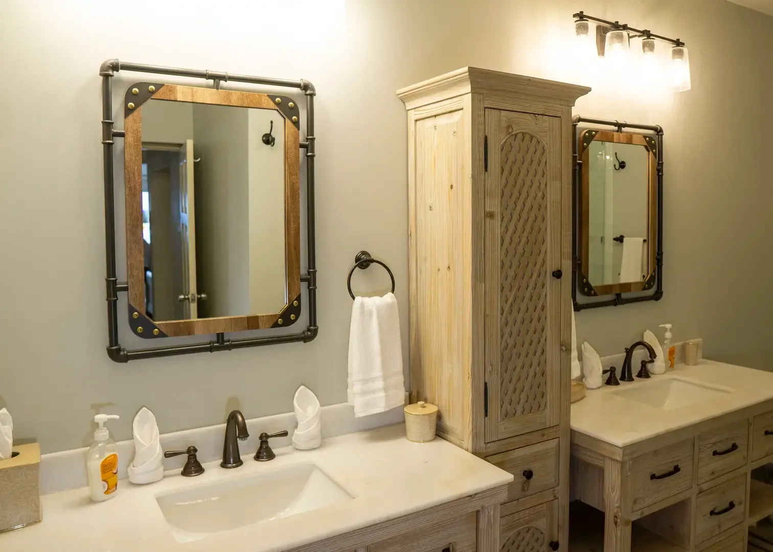 Double vanity bathroom with industrial accents — perfect for couples getting ready together.