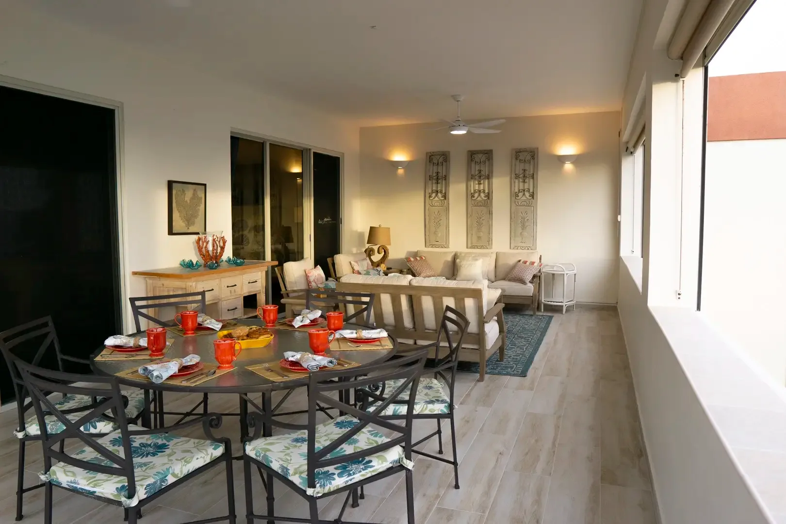 Set for a sunset dinner — your private dining room with coastal art and ocean breeze.