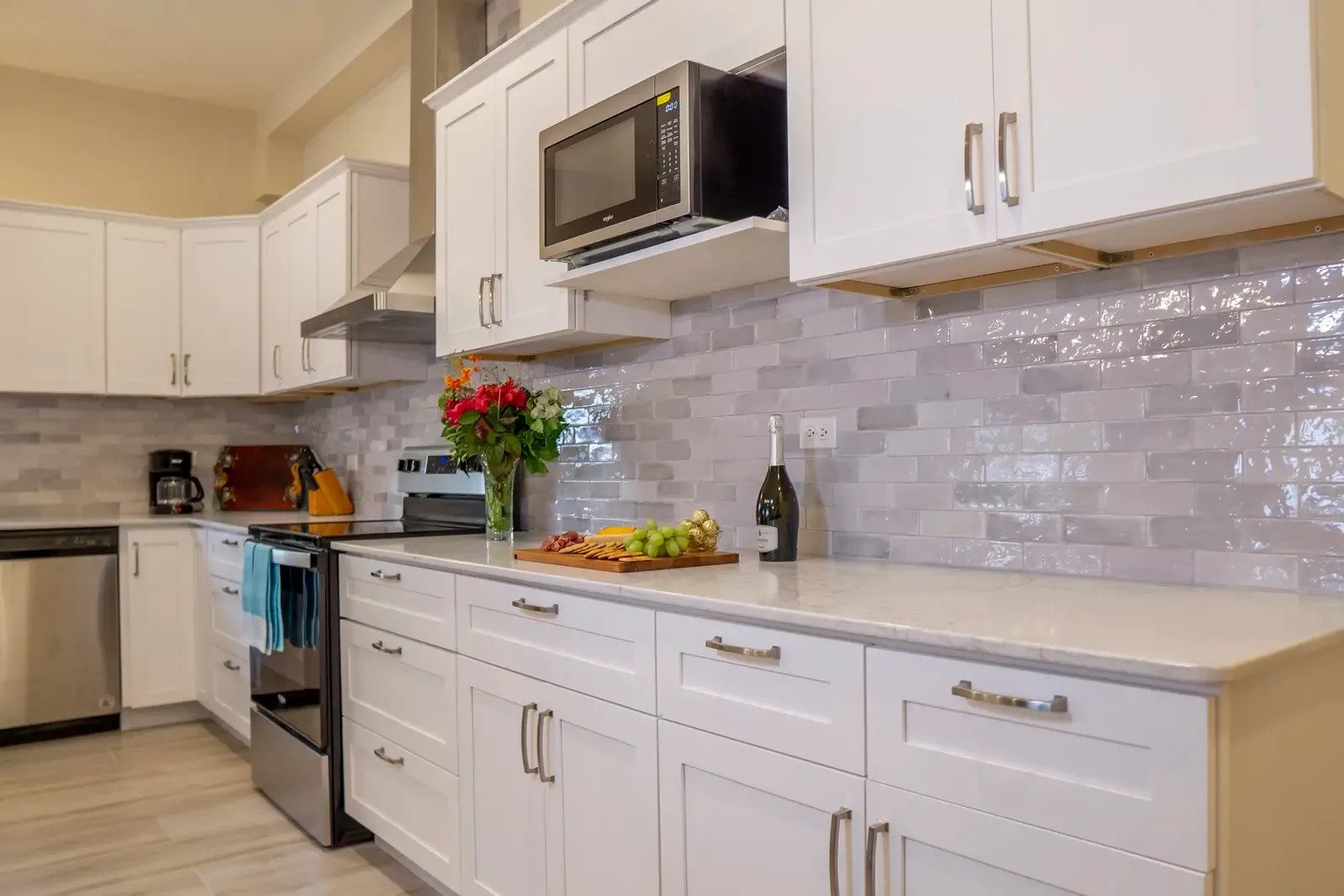Start your evening with wine and charcuterie at the kitchen island — vacation mode activated.