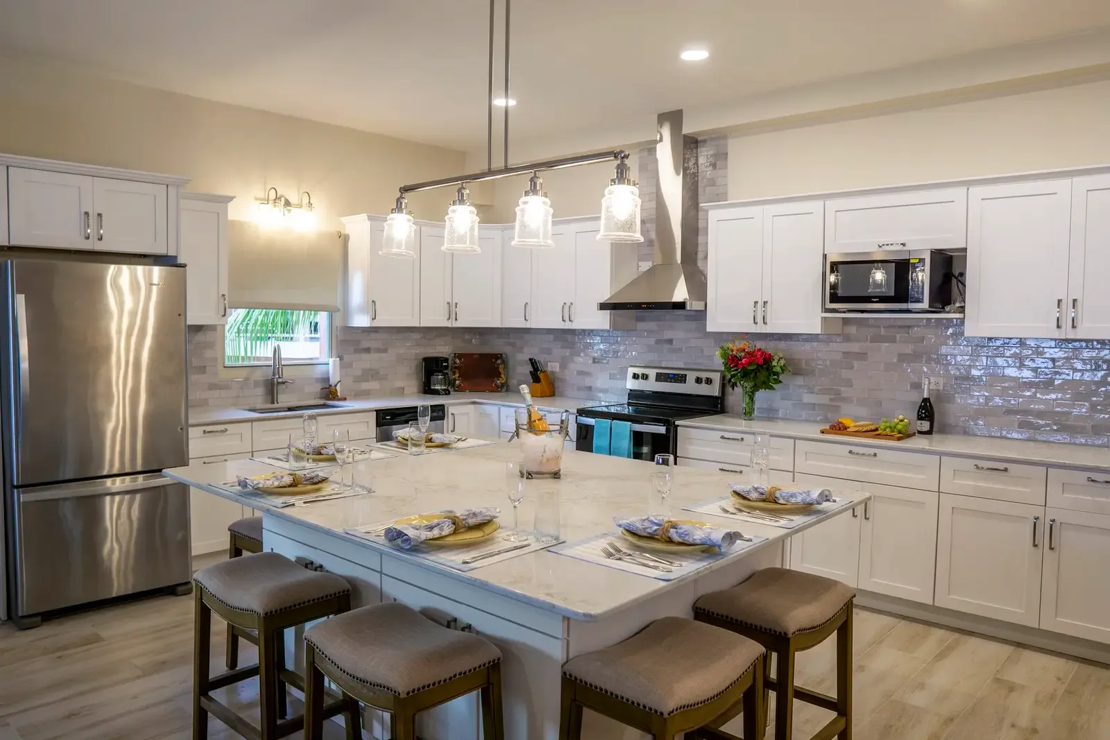 Gather around the kitchen island for morning coffee or evening cocktails with friends.