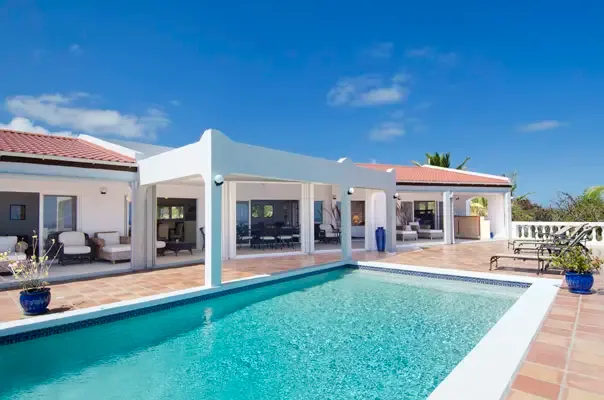 Private pool terrace with covered outdoor living and a classic Caribbean villa setting.