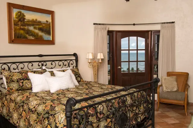 Fall asleep gazing at the Caribbean through your French doors — the gentle sea breeze whispers goodnight.