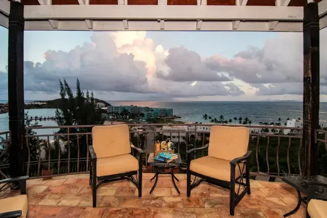 Sip your morning coffee watching golden-hour light dance across the ocean — your private terrace paradise.