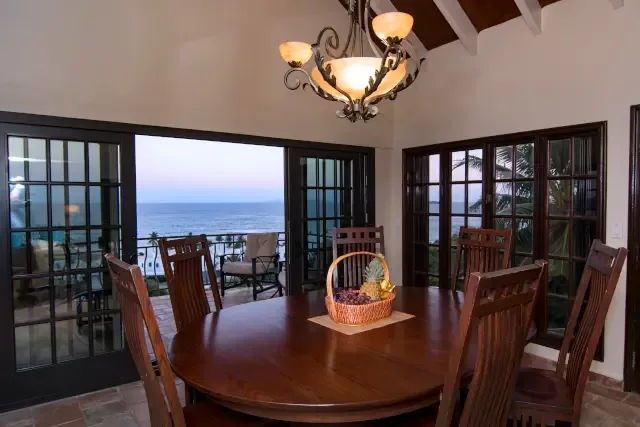 Gather for dinner with an ocean view — the round table seats six for unforgettable meals together.