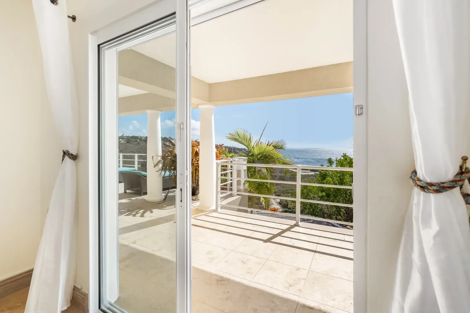 Step from bed to terrace — your bedroom opens to outdoor views.