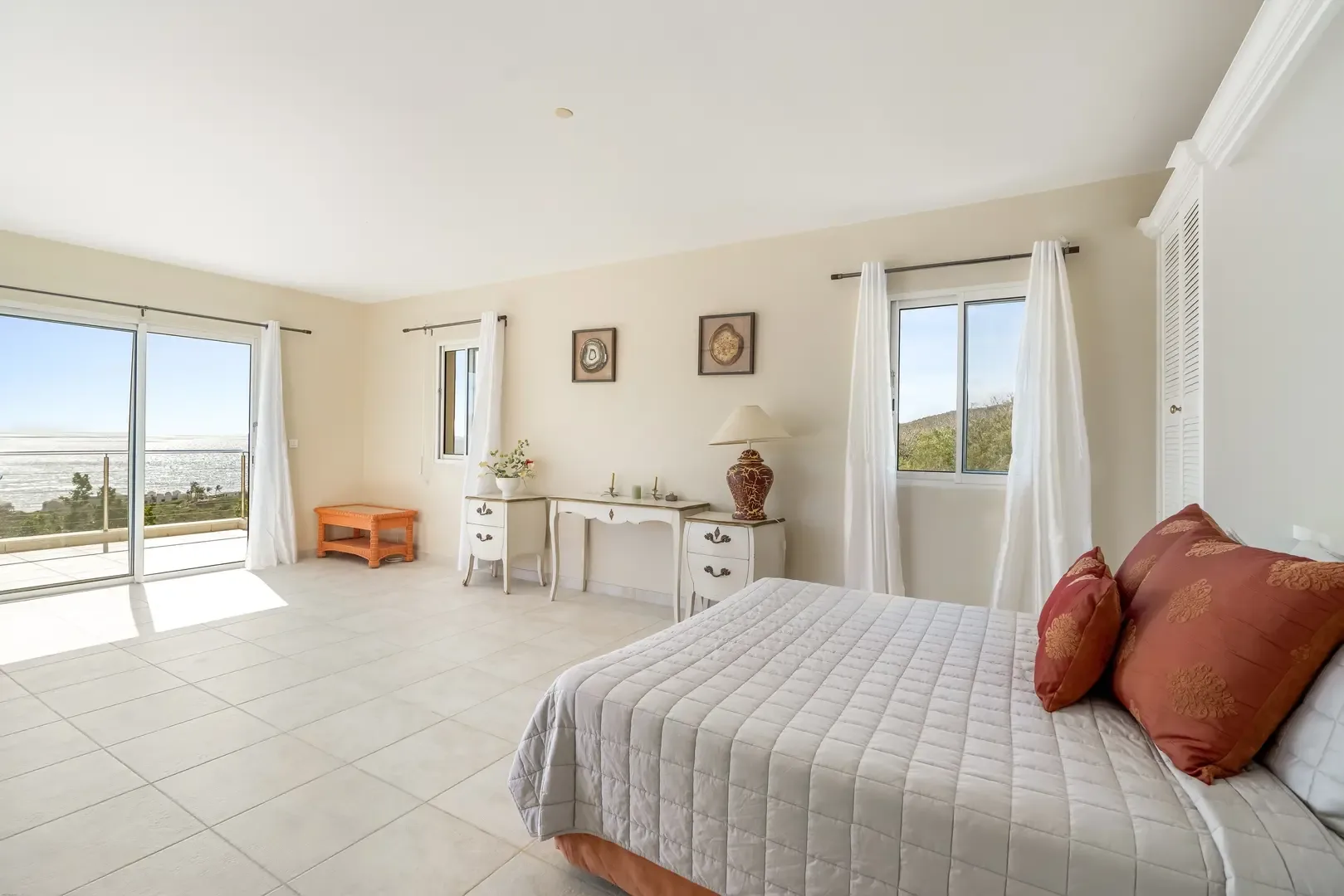 Two terraces, one bedroom — garden and ocean views await.