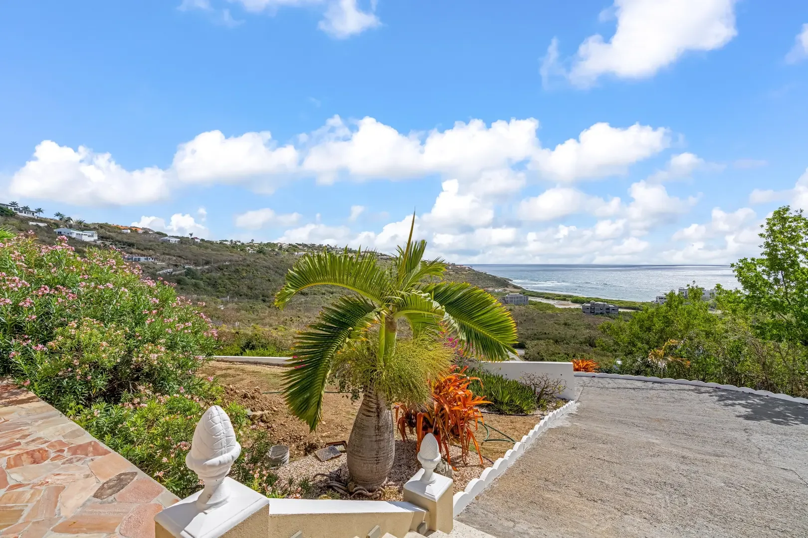 Arrive to panoramic ocean views — your hillside retreat welcomes you.