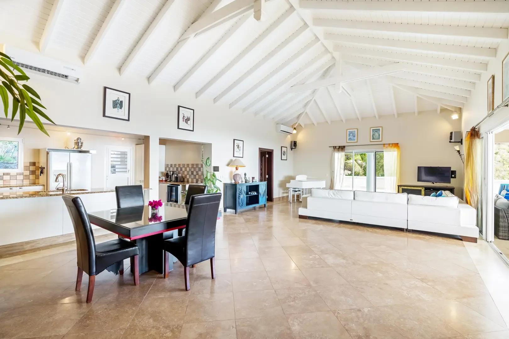 High vaulted ceilings and open flow — your living space breathes with light.
